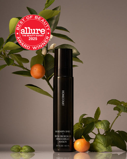 Homecourt Mandarin Basile room deodorant bottle with Allure seal and citrus accents