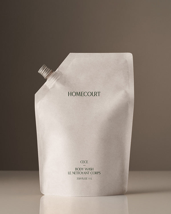 white body wash refill pouch with green text