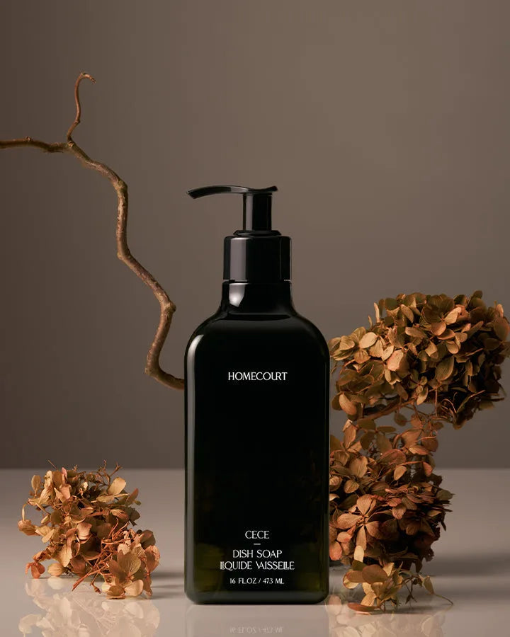 Homecourt Cece Dish Soap beside dried hydrangeas