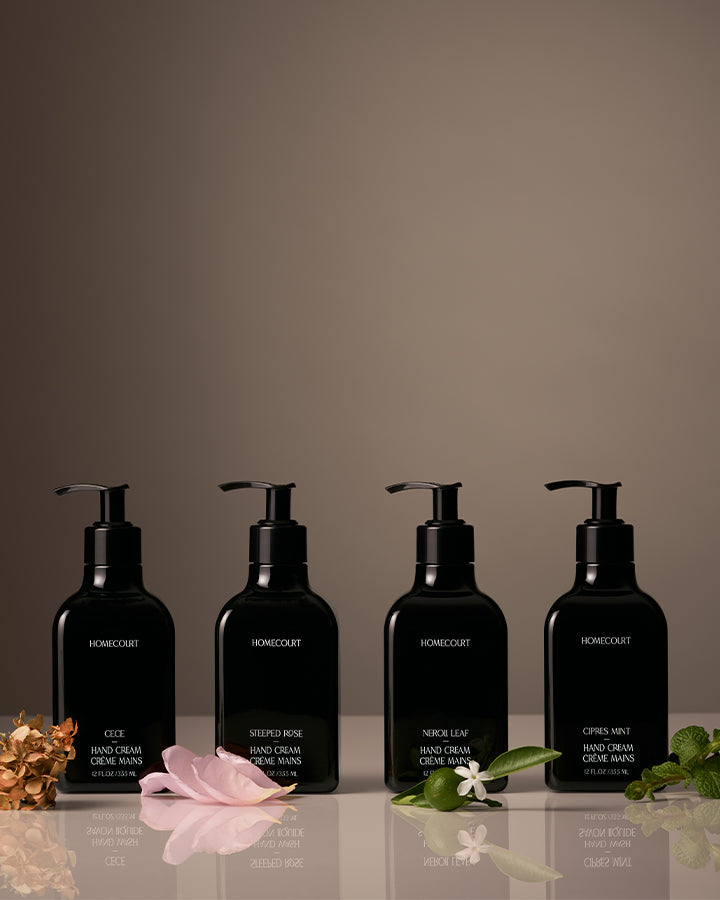 Luxury hand wash and lotion set featuring Cece, Steeped Rose, Neroli Leaf, and Cipres Mint scents with matching floral accents.